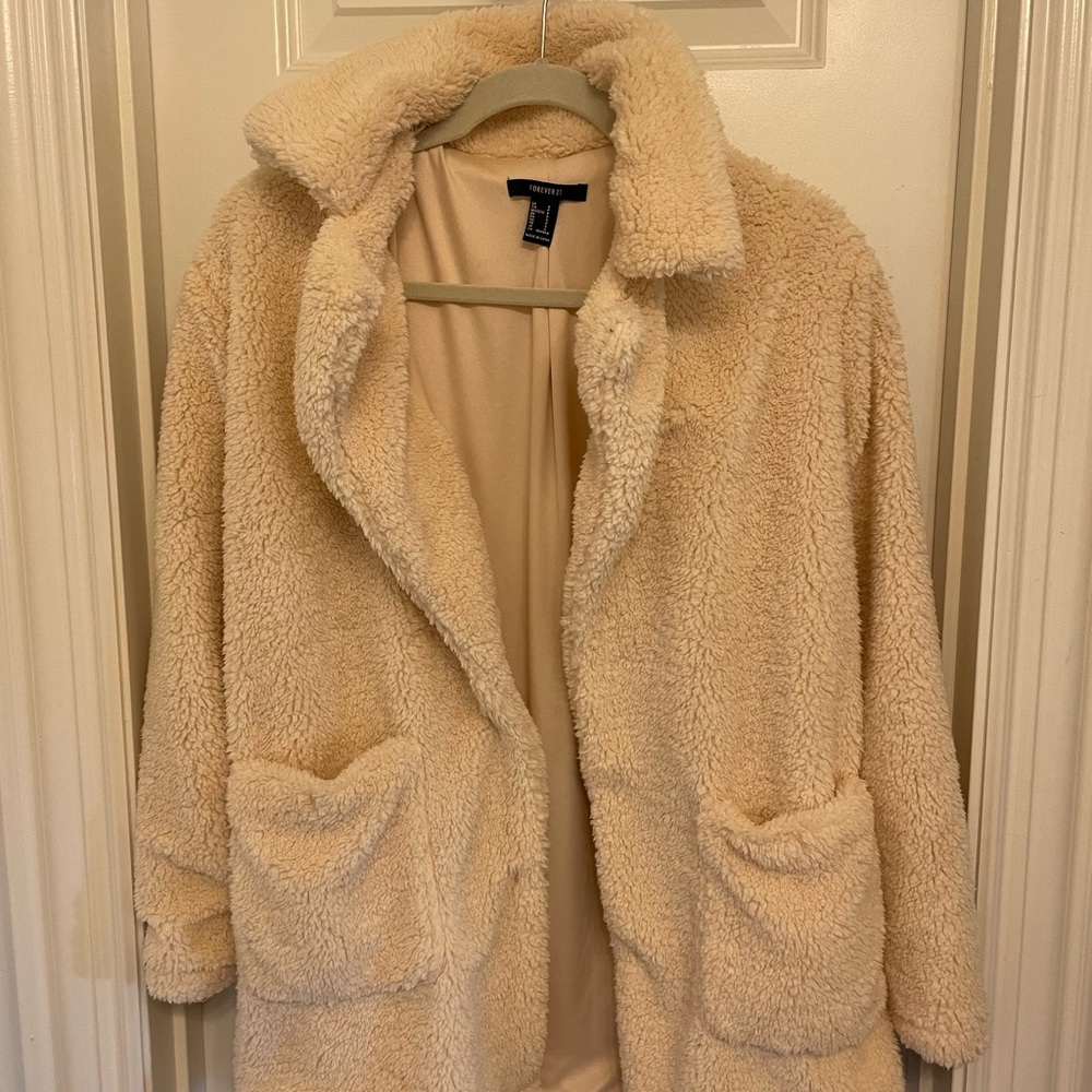 woman’s fur coat with pockets
